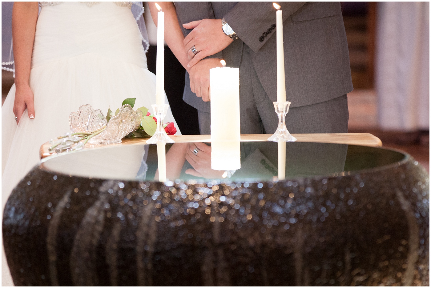 picture of bride & groom holding hands