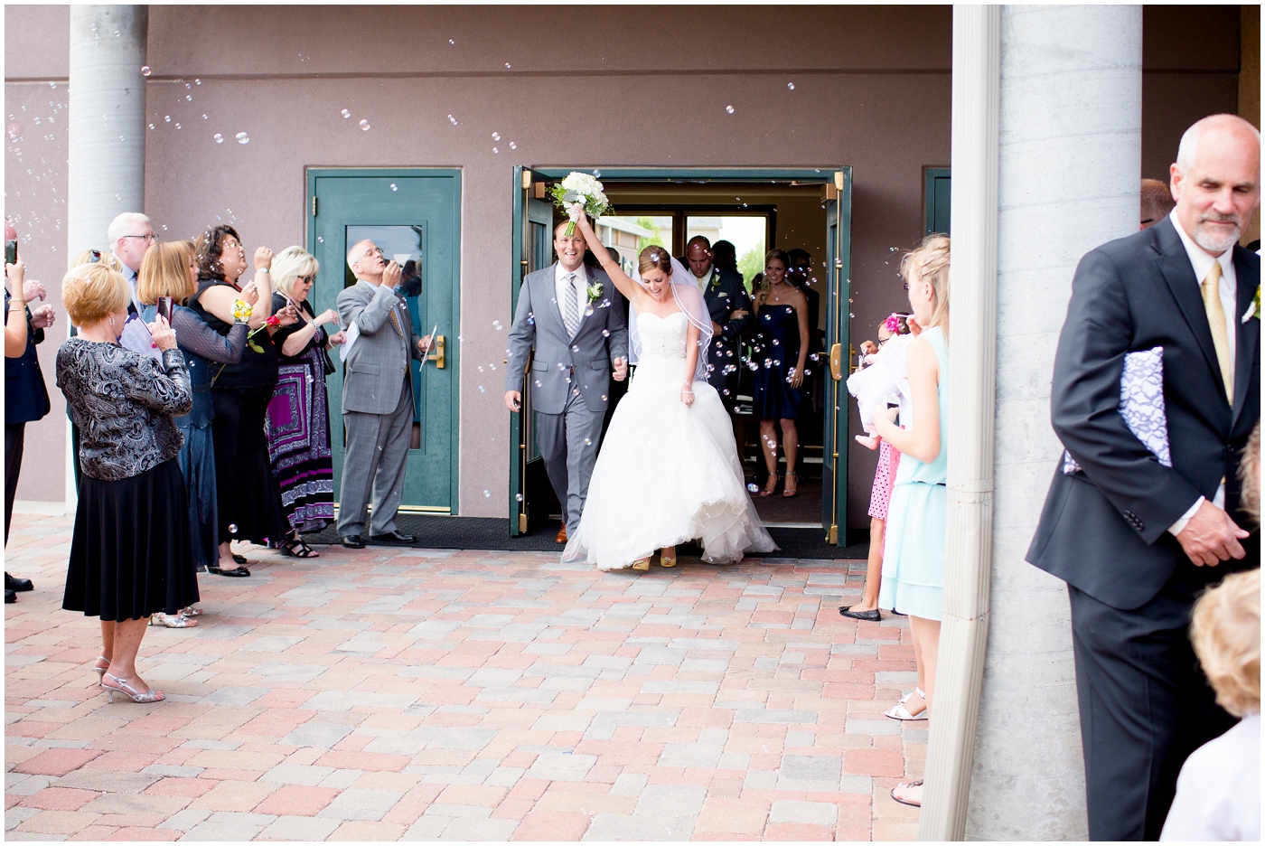 picture of bride & groom during bubble exit