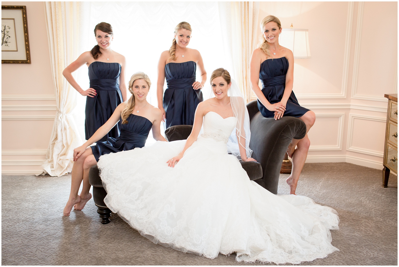 picture of bride and bridesmaids on a couch