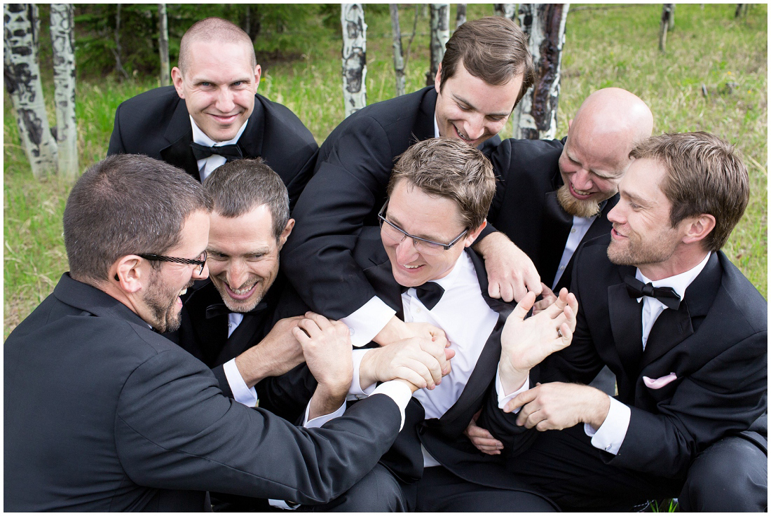 photo of groomsmen goofing around