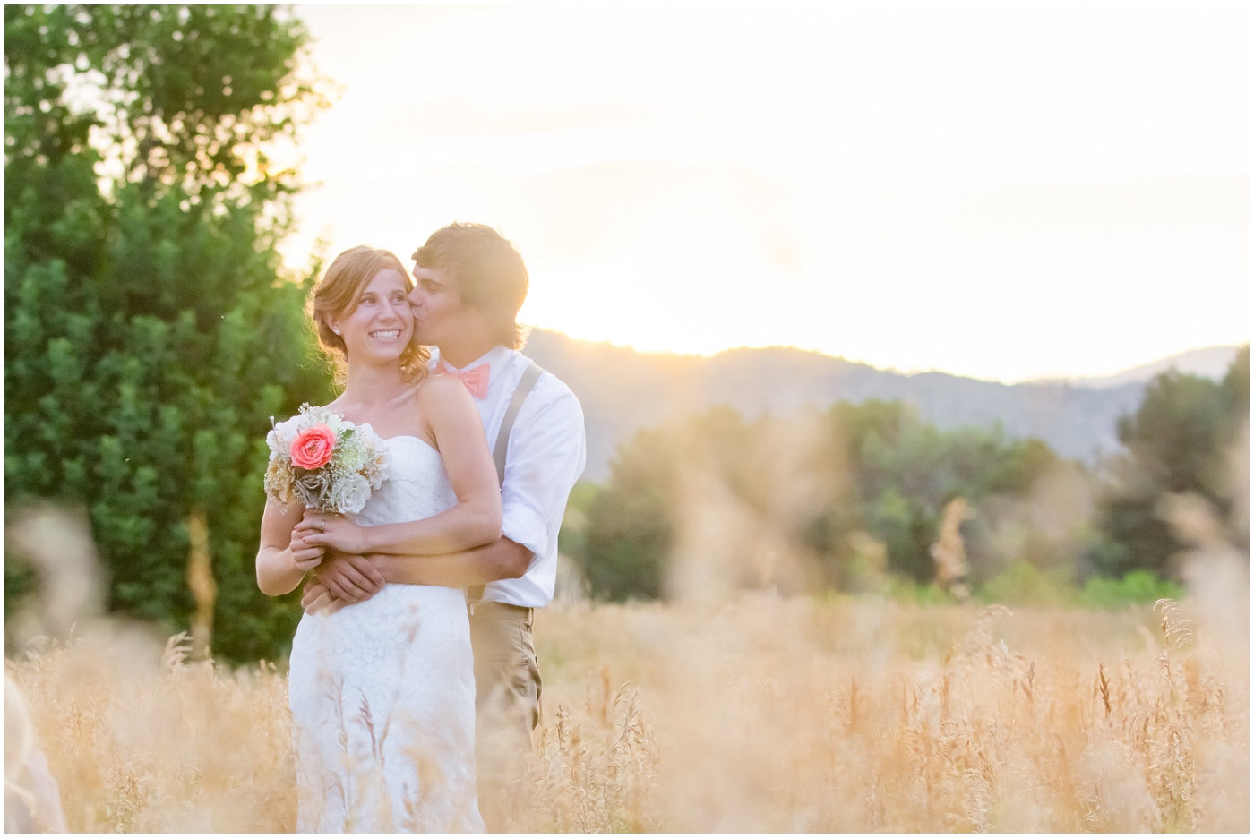 picture of bride and groom in a field