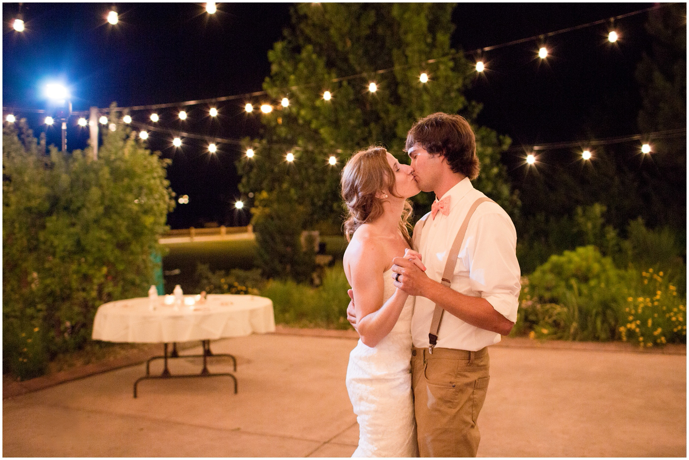 picture of bride and groom dancing outdoors