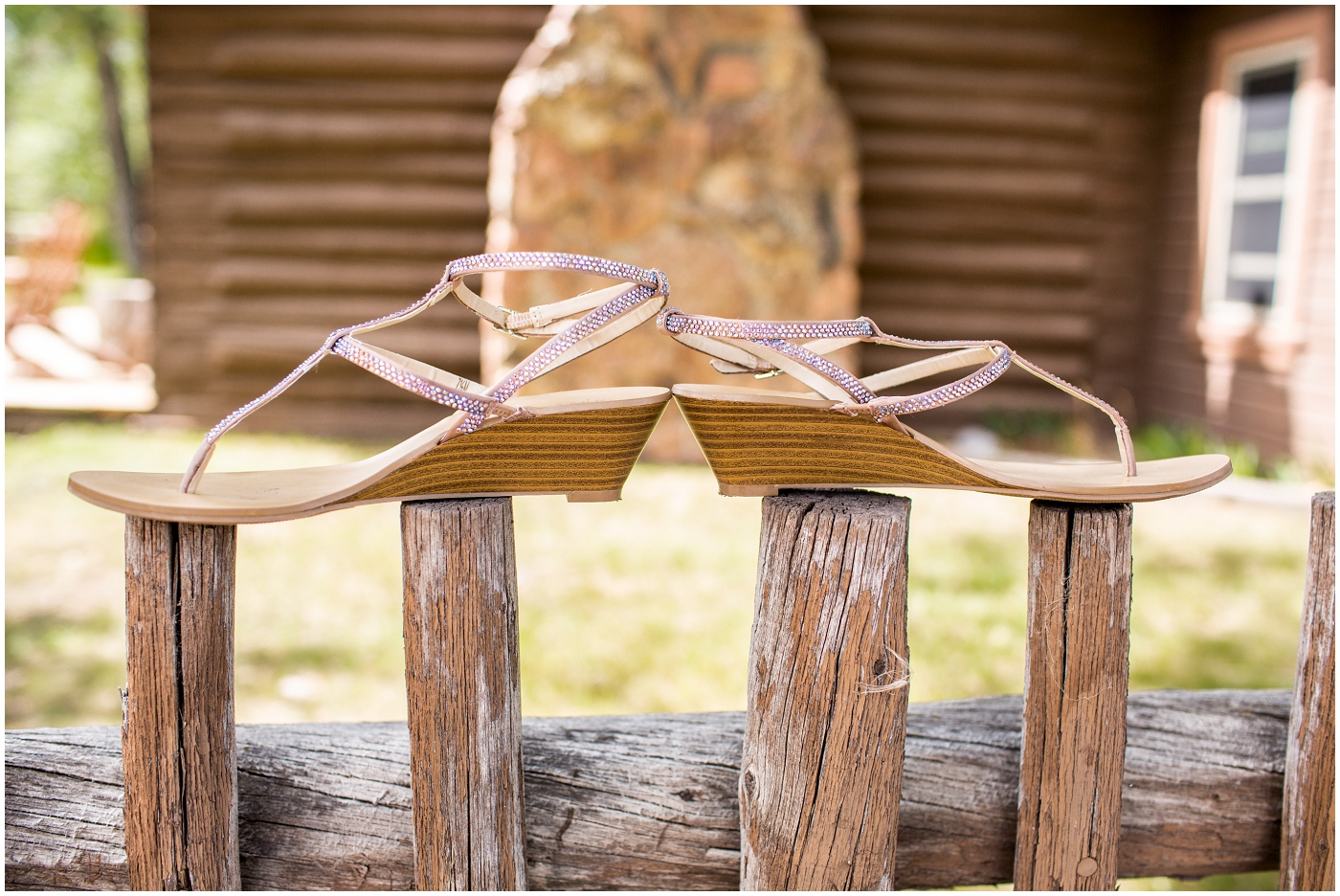 picture of bridal sandals on fence