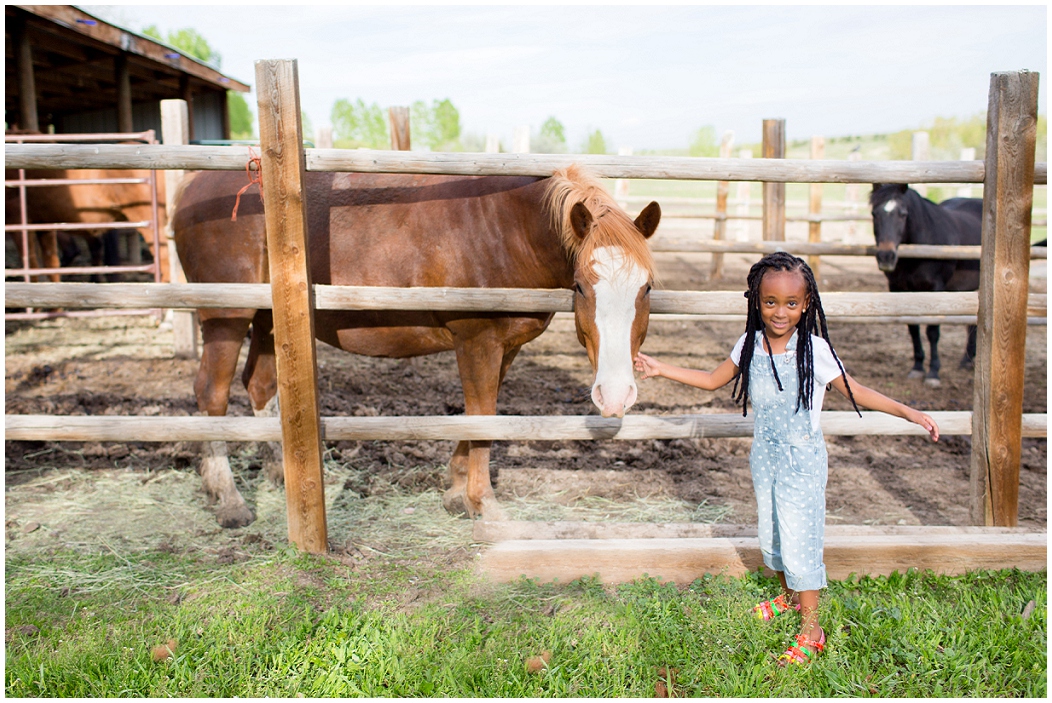 picture of child with a horse