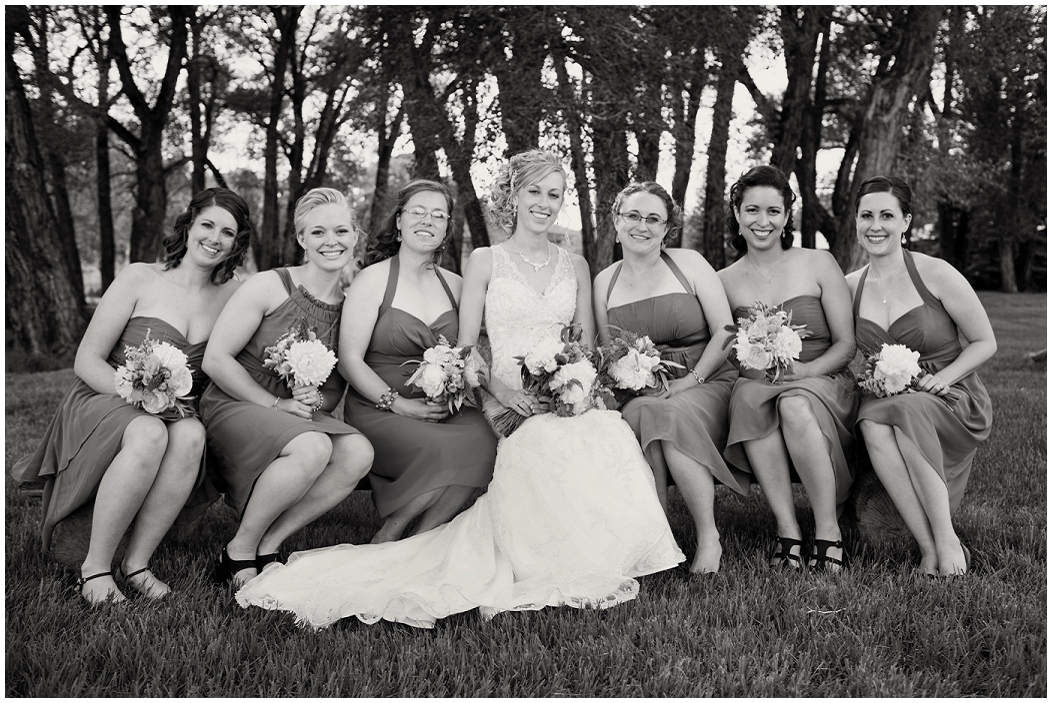 picture of bridesmaids sitting on a bench