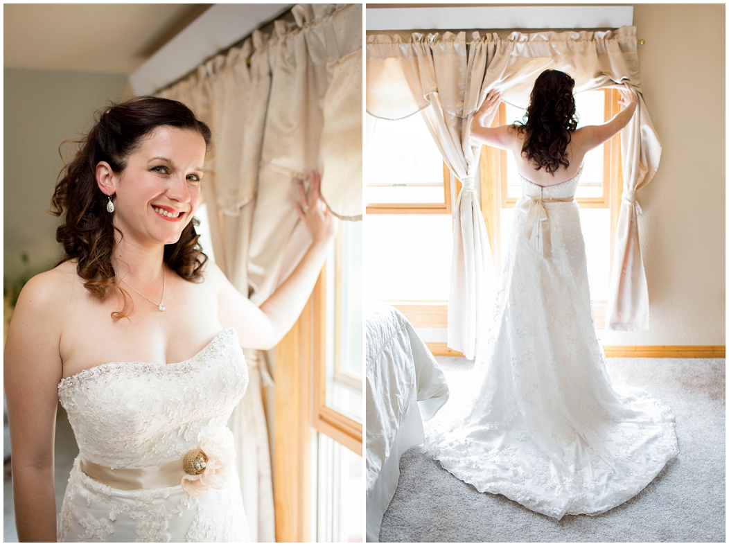 picture of bride standing in a window