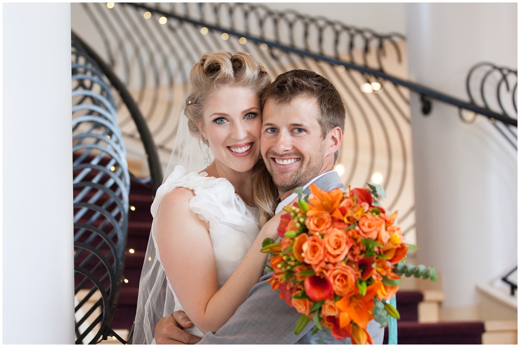 picture of bride and groom on staircase