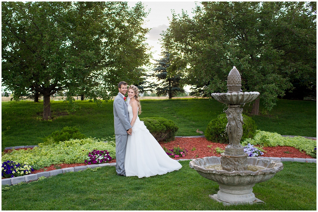 picture of bride and groom in a garden