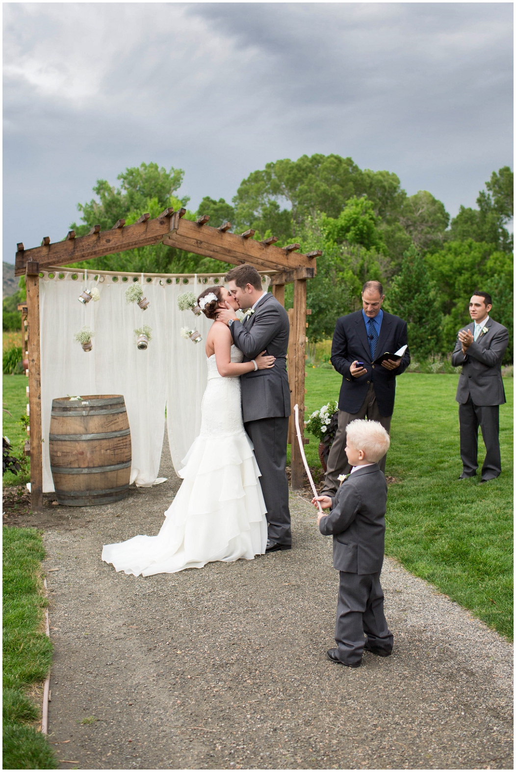 picture of bride and groom's first kiss