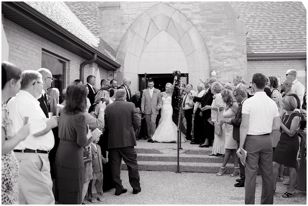 picture of bride and groom exiting church