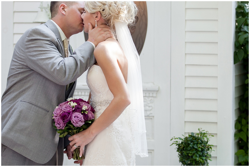 picture of bride and groom kissing