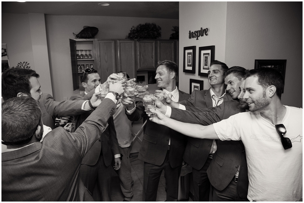 picture of groomsmen toasting