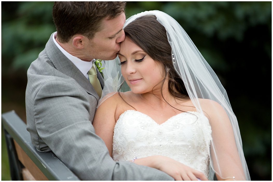 picture of bride and groom kissing
