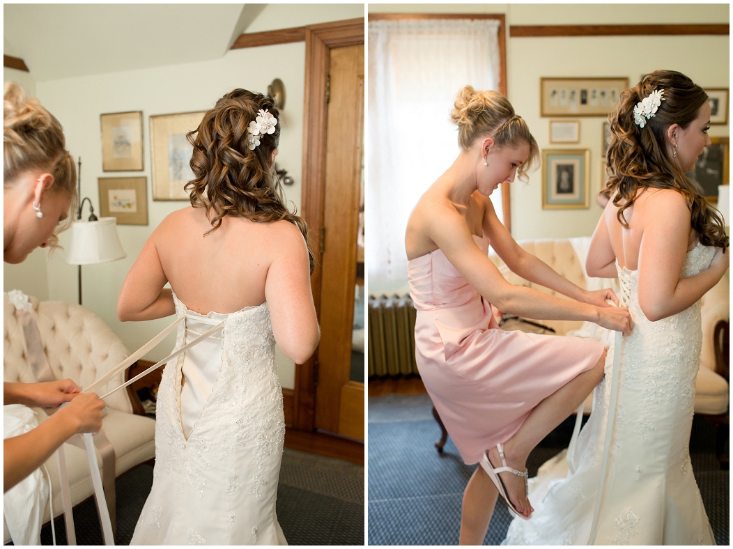 picture of bride getting in her dress