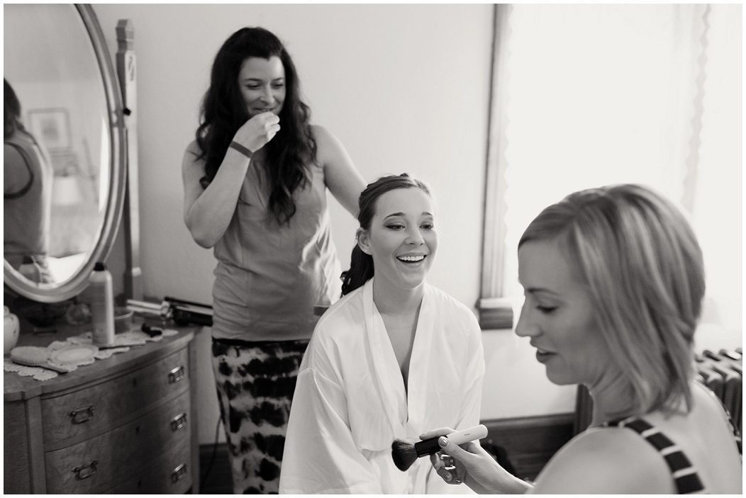 picture of bride getting hair and make-up done