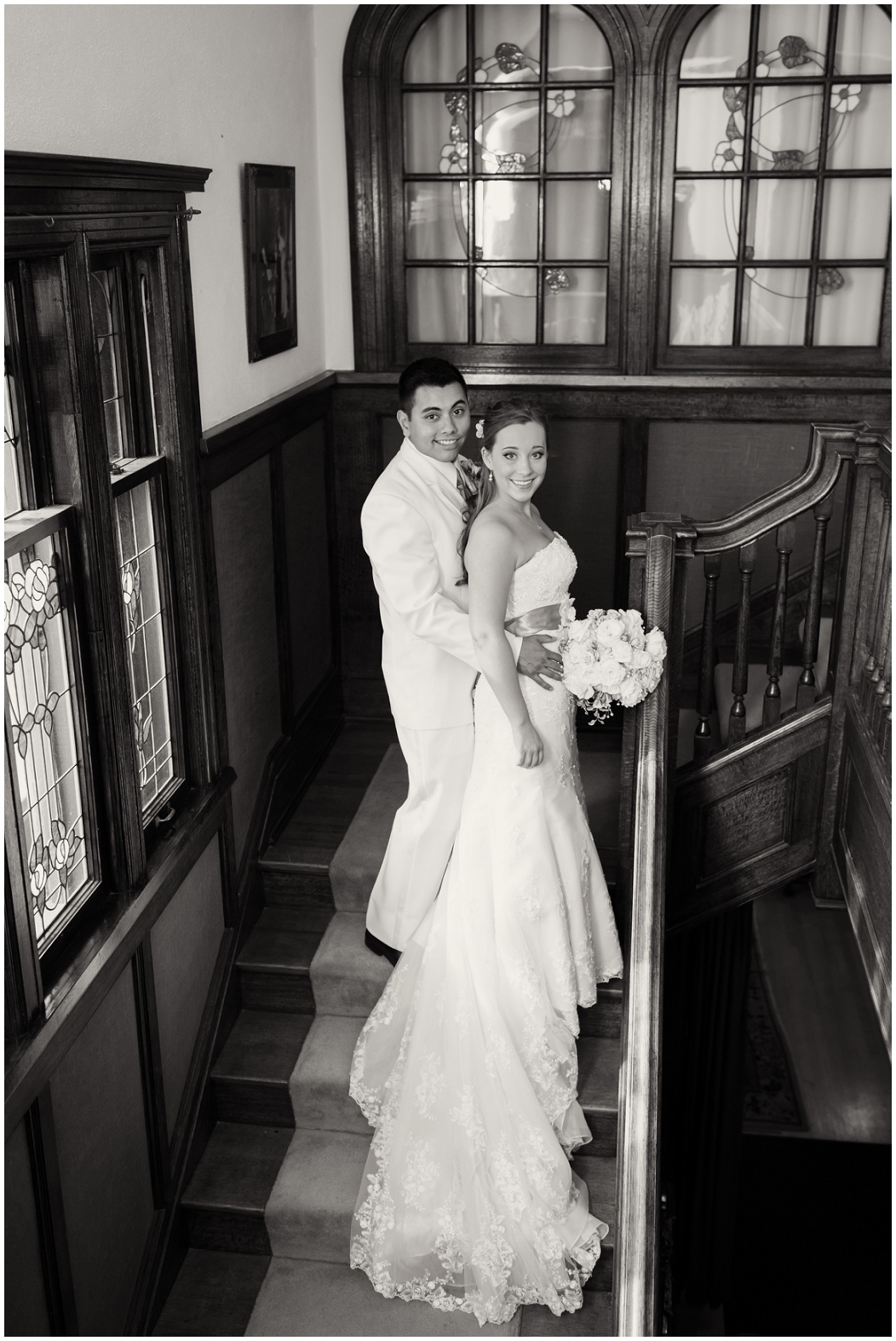picture of bride and groom on a staircase