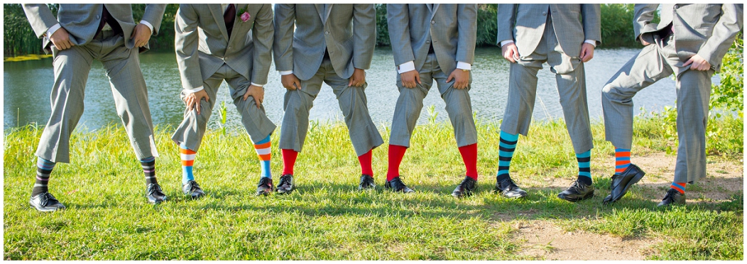 picture of groom and groomsmen with crazy socks 