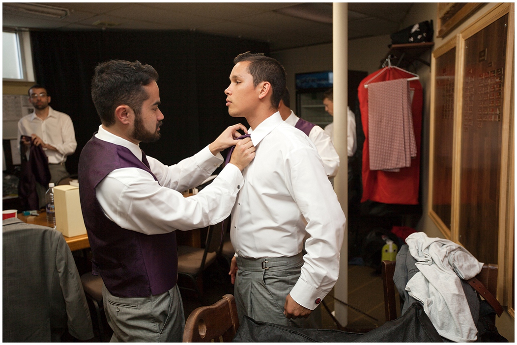 picture of groomsmen getting ready for wedding
