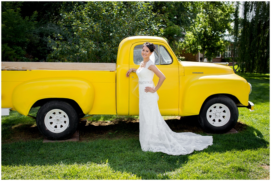 picture of bride with an old truck