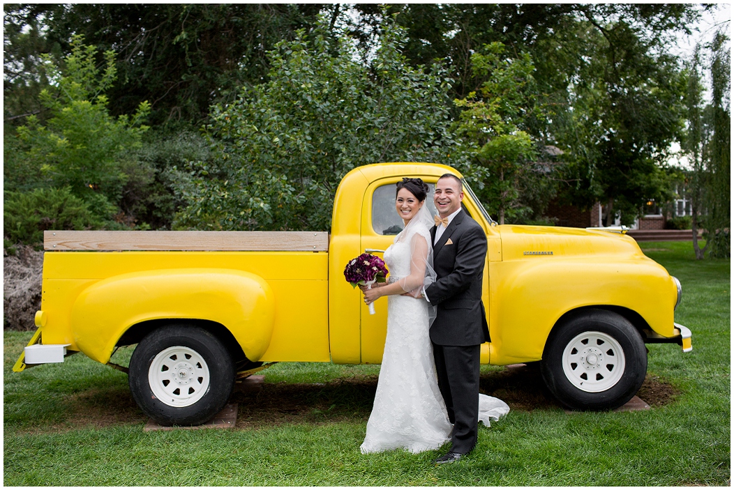picture of bride and groom with vintage truck