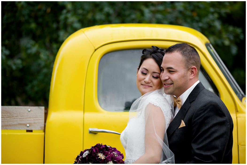 picture of bride and groom with vintage truck