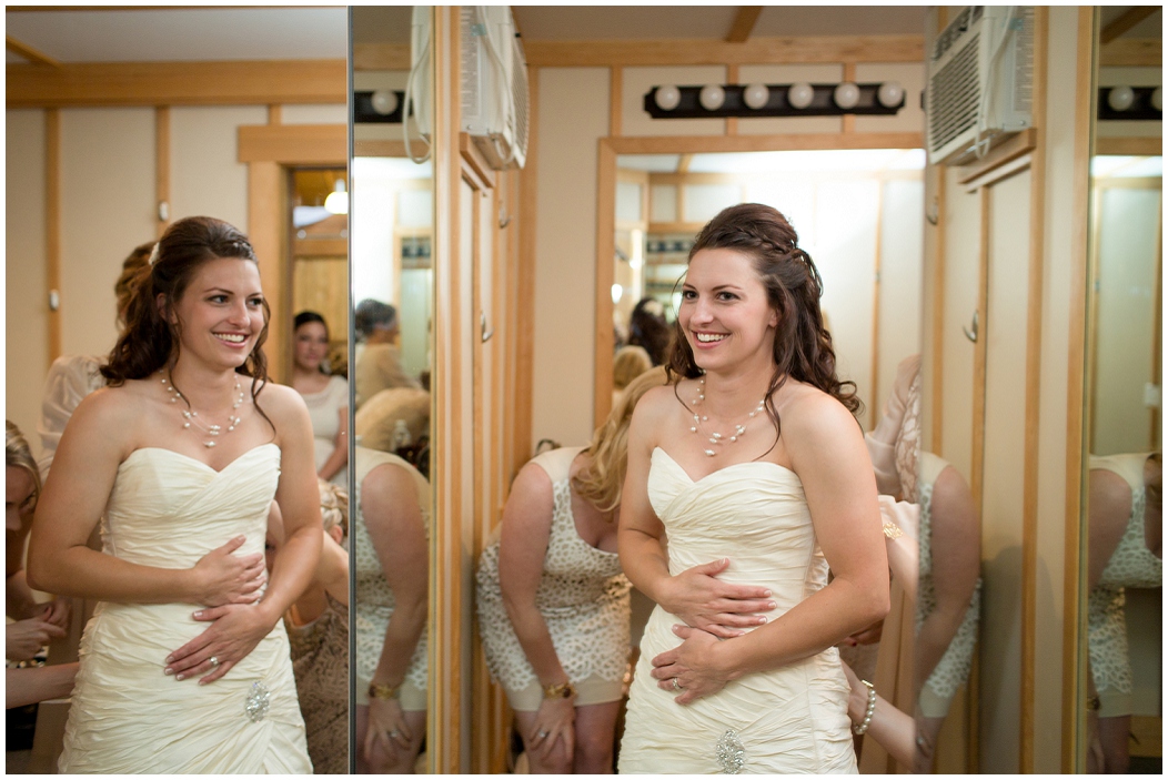 picture of bride getting in her dress