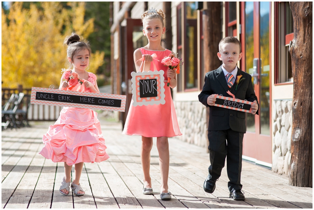 picture of flower girls carrying chalkboards