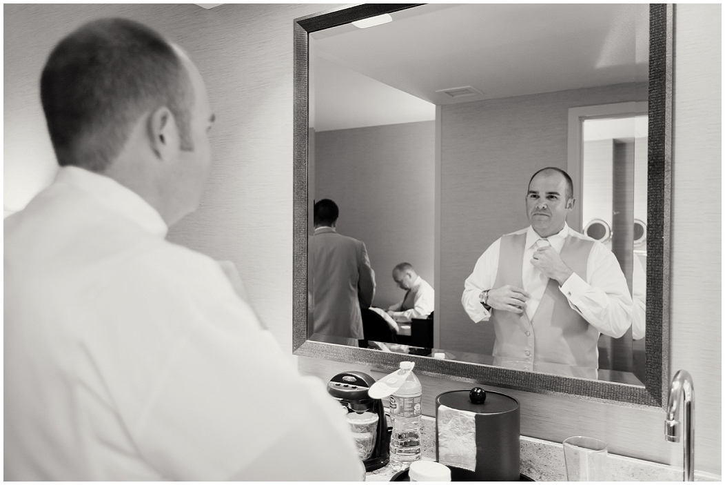 picture of groom getting ready for wedding