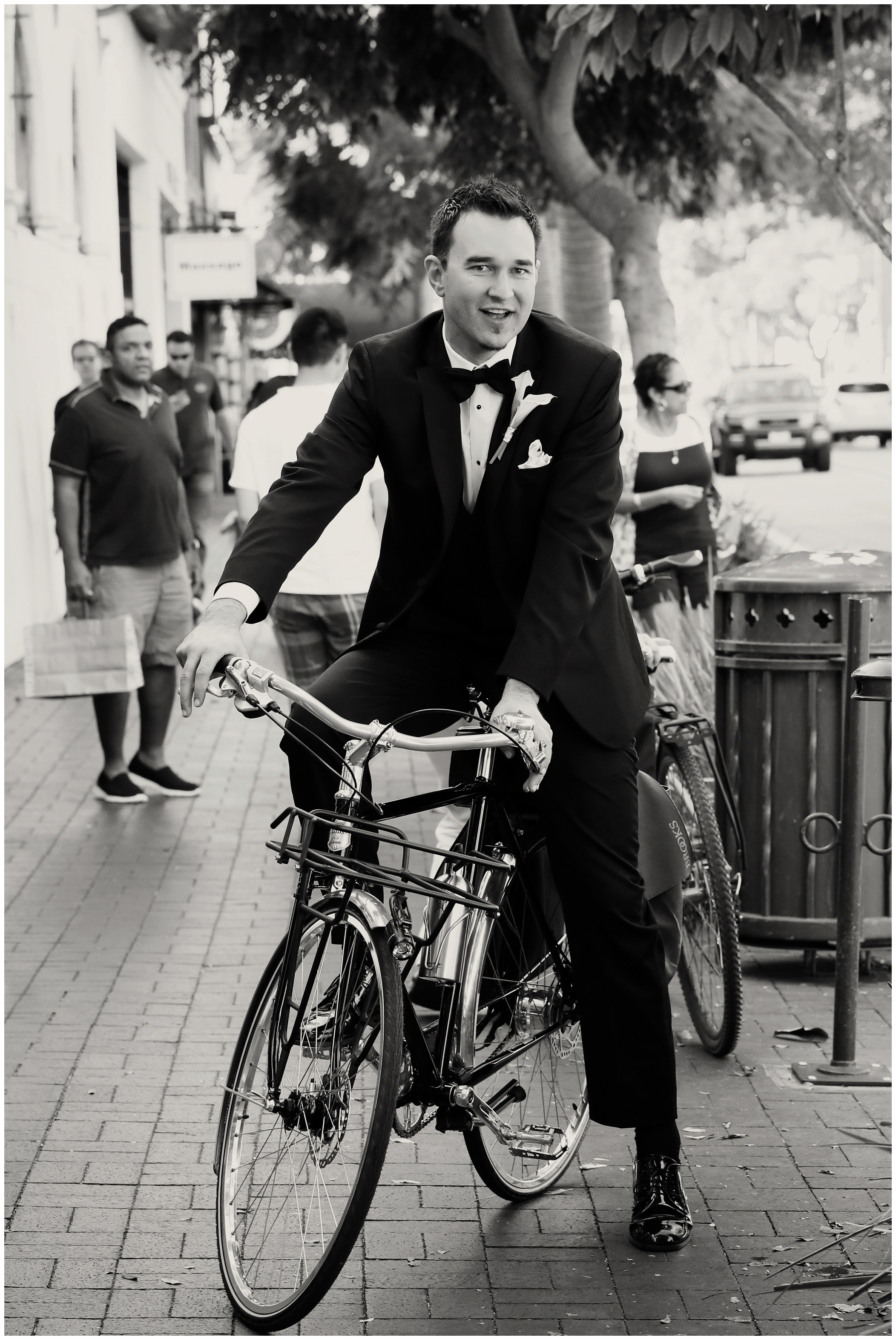 picture of groom on a bicycle