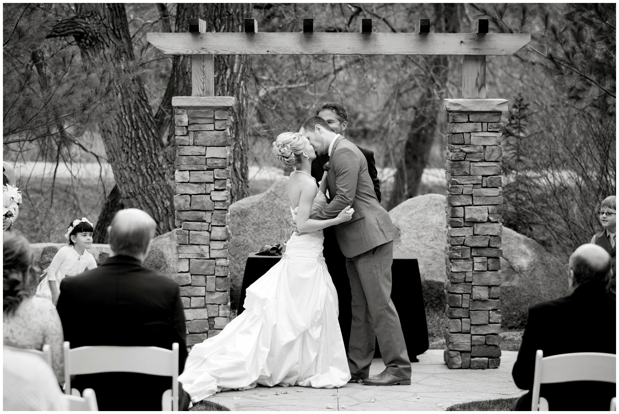 picture of first kiss by Boulder wedding photographer 