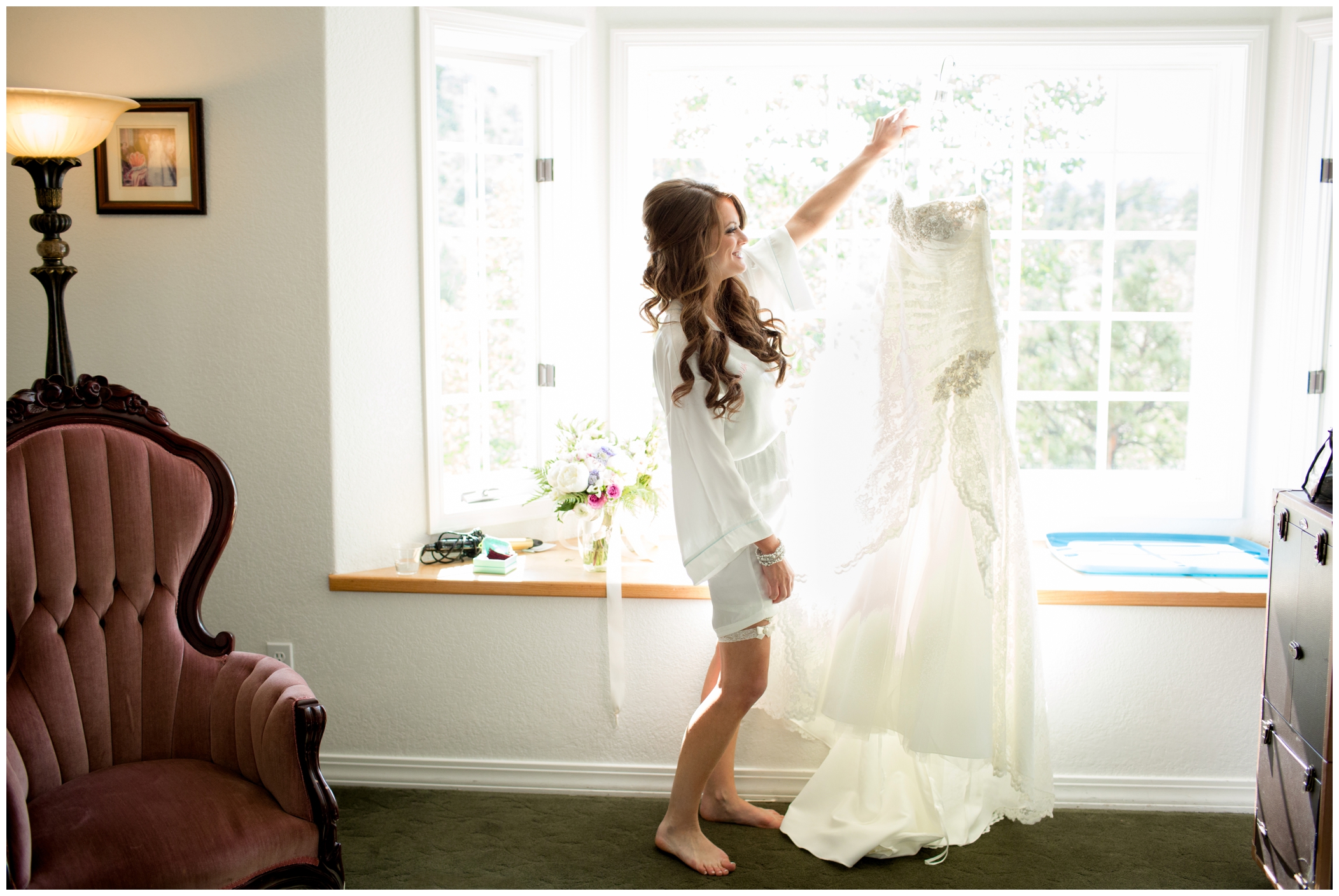 picture of bride holding her dress
