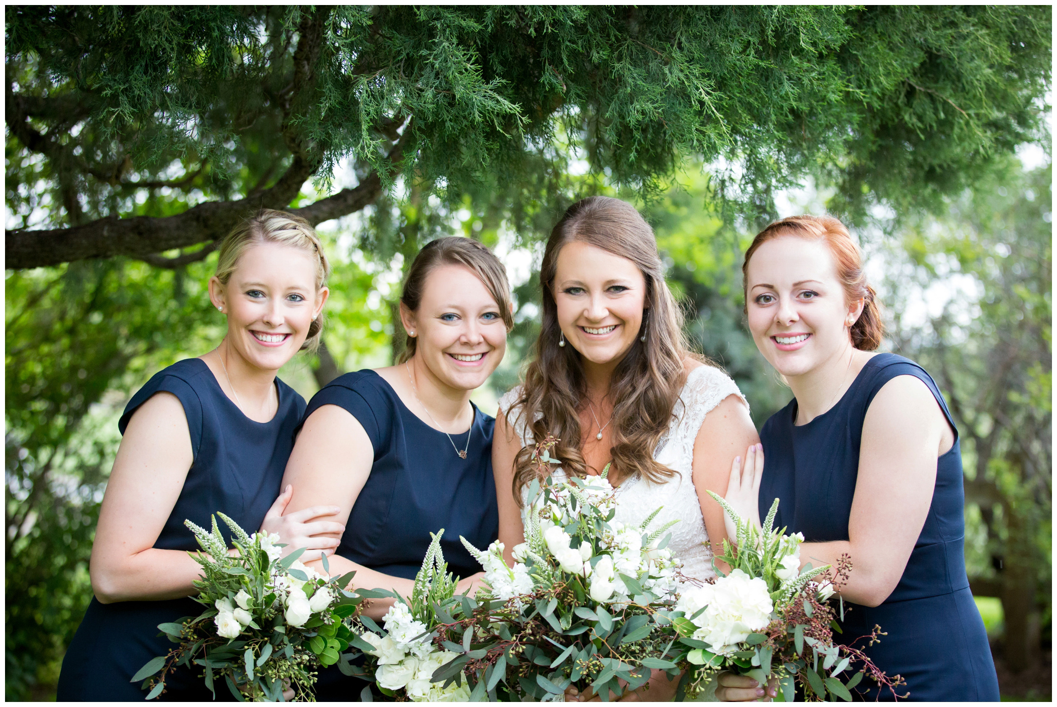 picture of bridesmaids in simple navy dresses