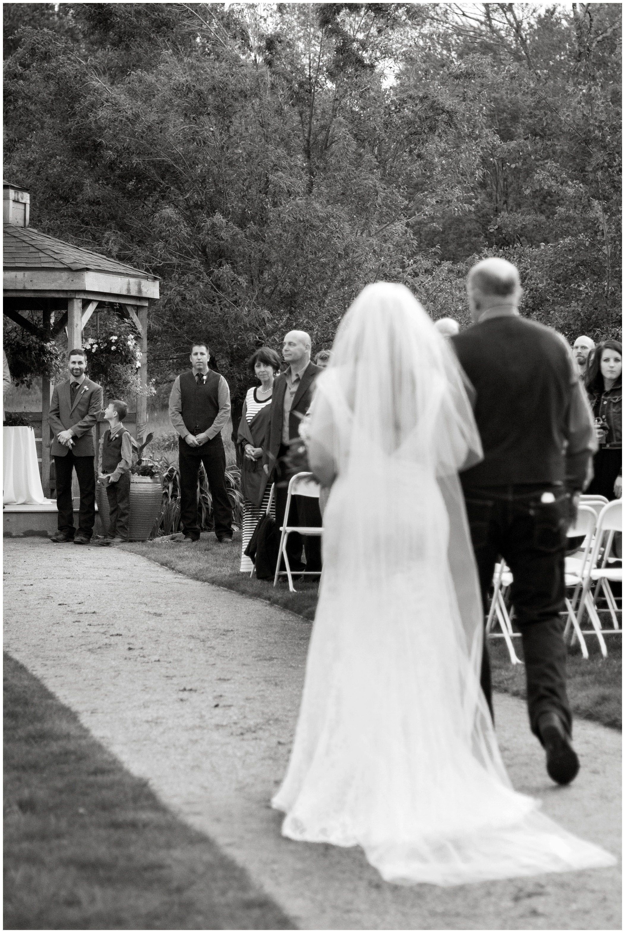 picture of bride walking down the aisle at Littleton wedding