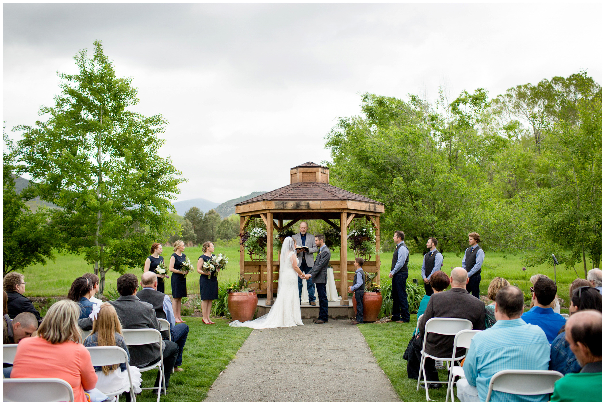 outdoor wedding ceremony by Colorado wedding photographer Plum Pretty Photography 