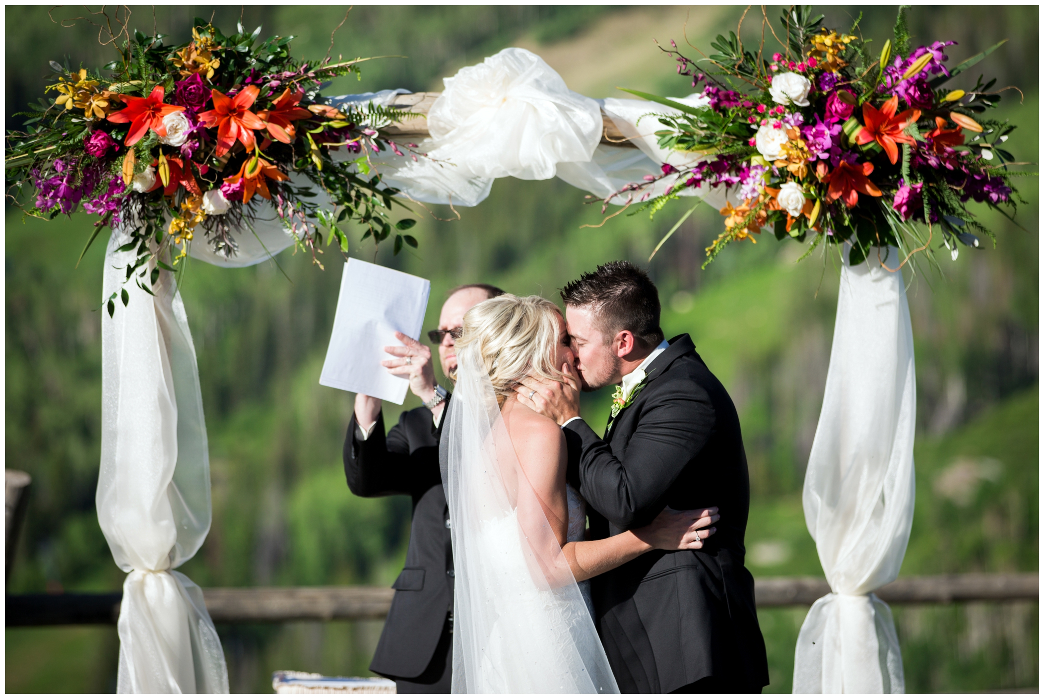 first kiss at colorado mountain wedding 