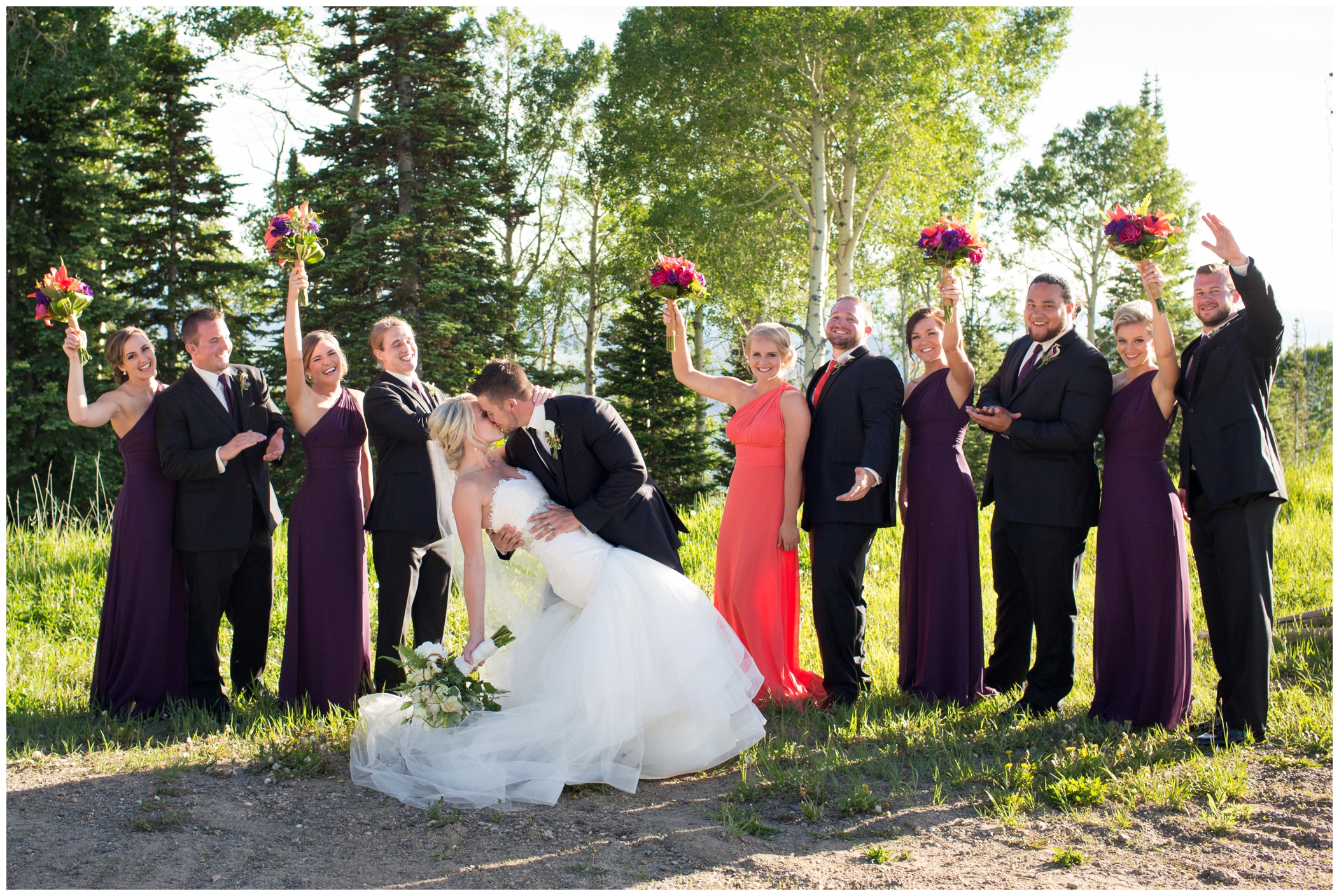 wedding party in purple and coral 