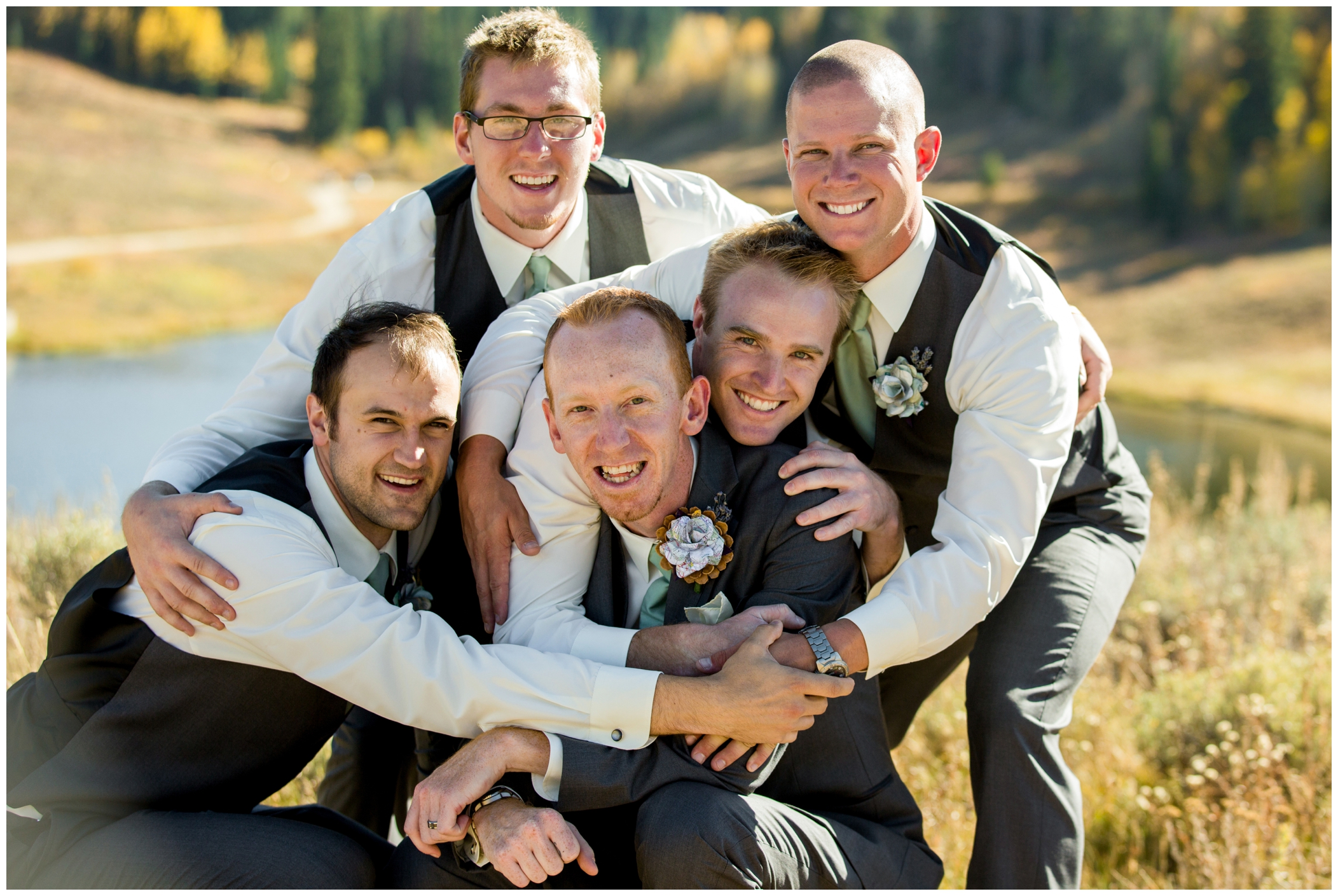groomsmen in gray vests