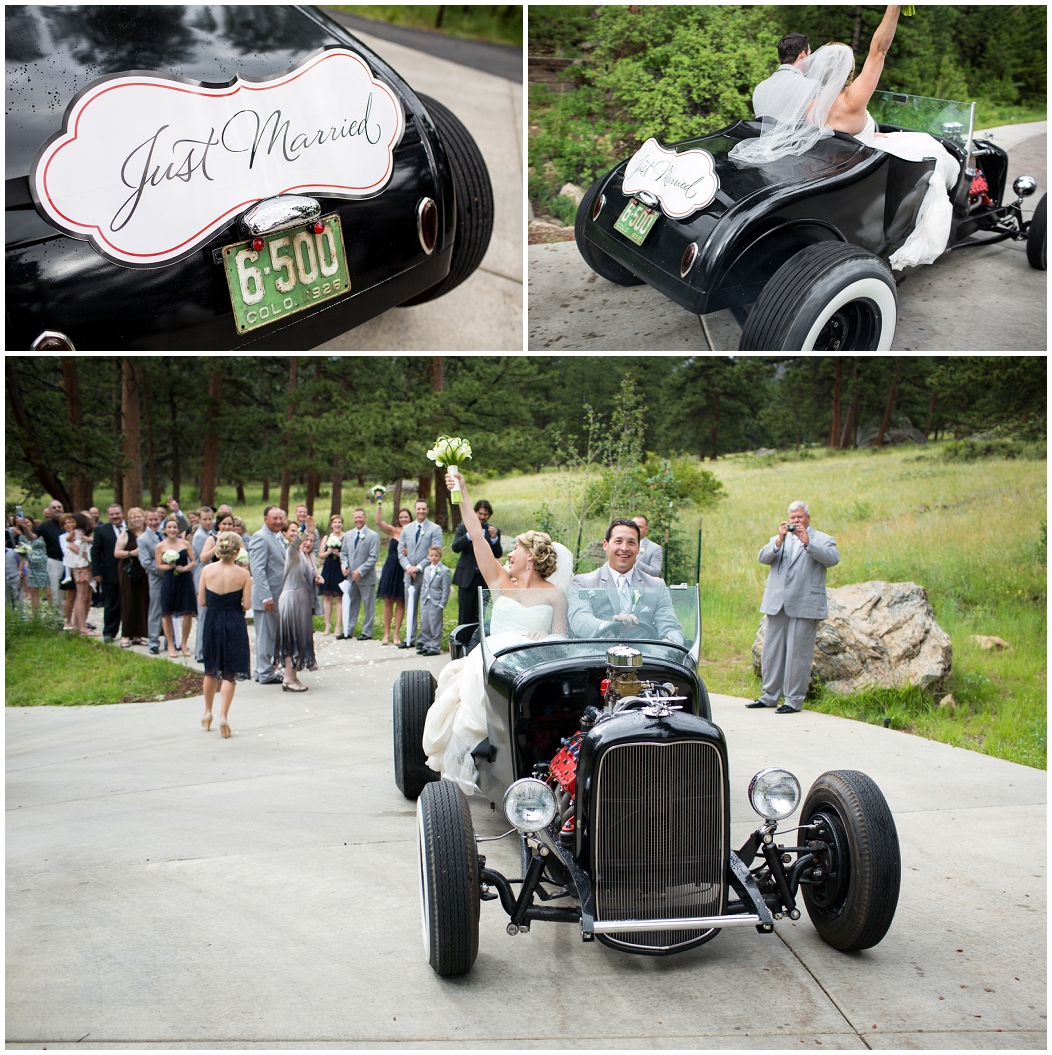 picture of bride and groom driving in vintage car