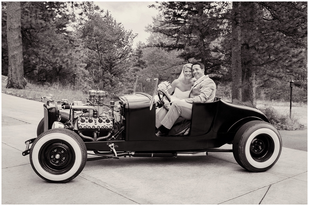 picture of bride and groom in vintage car