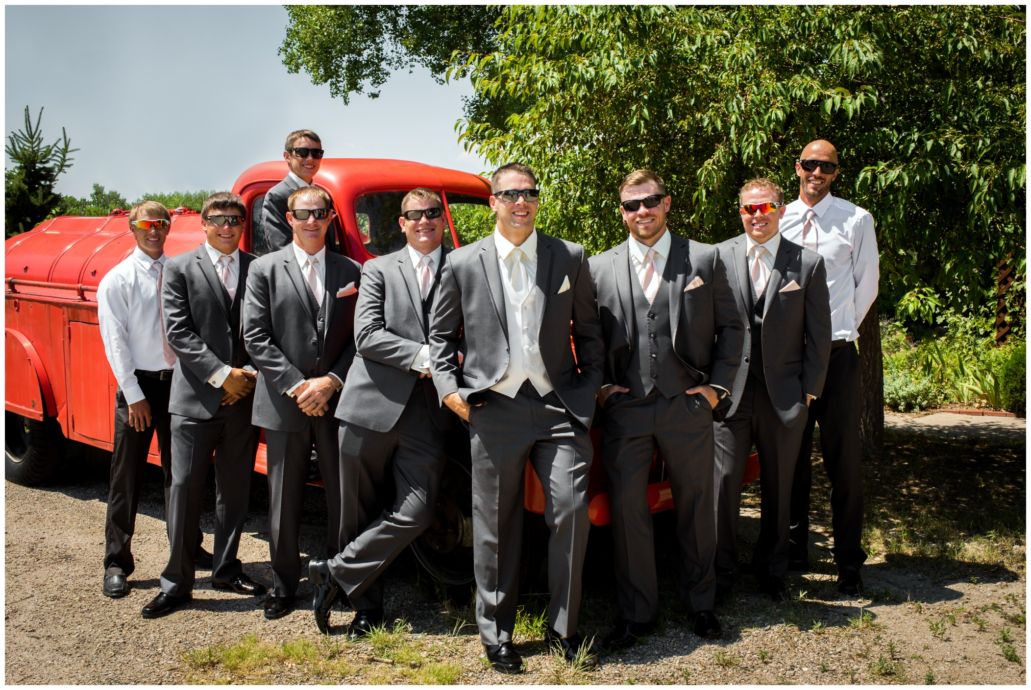 groom and groomsmen in gray suits 