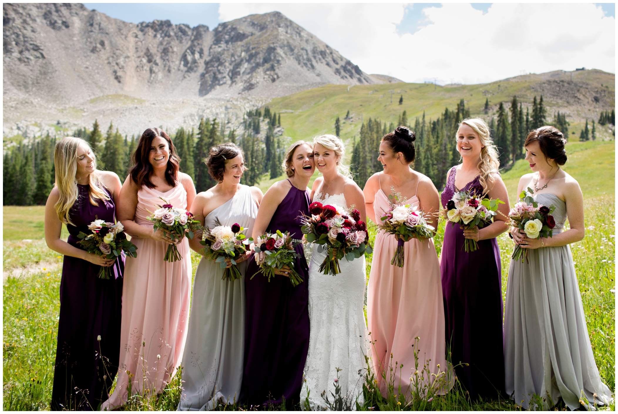 bridesmaids in pink and purple dresses at Black Mountain Lodge A Basin 