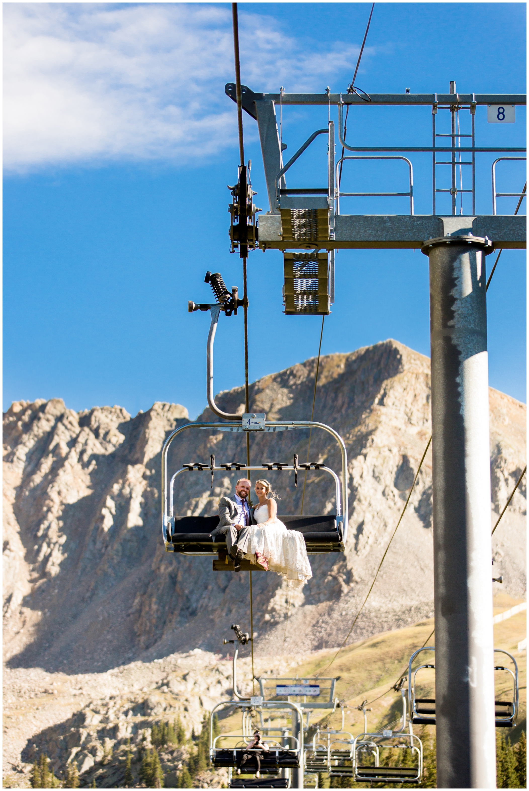 bride and groom on chairlift at Arapahoe Basin Colorado ski resort wedding 