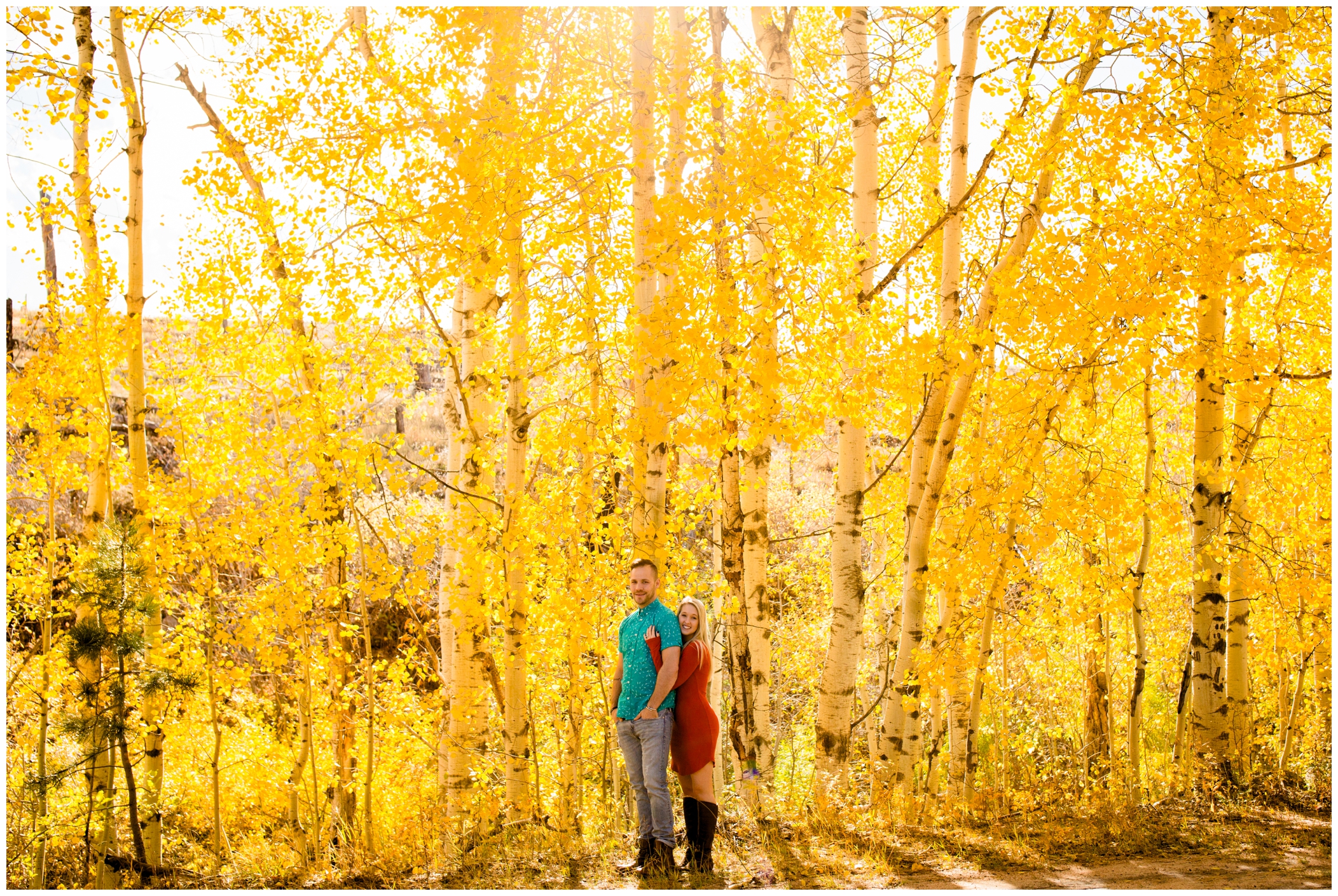 Colorful fall engagement photos with aspen trees in Boulder Colorado 
