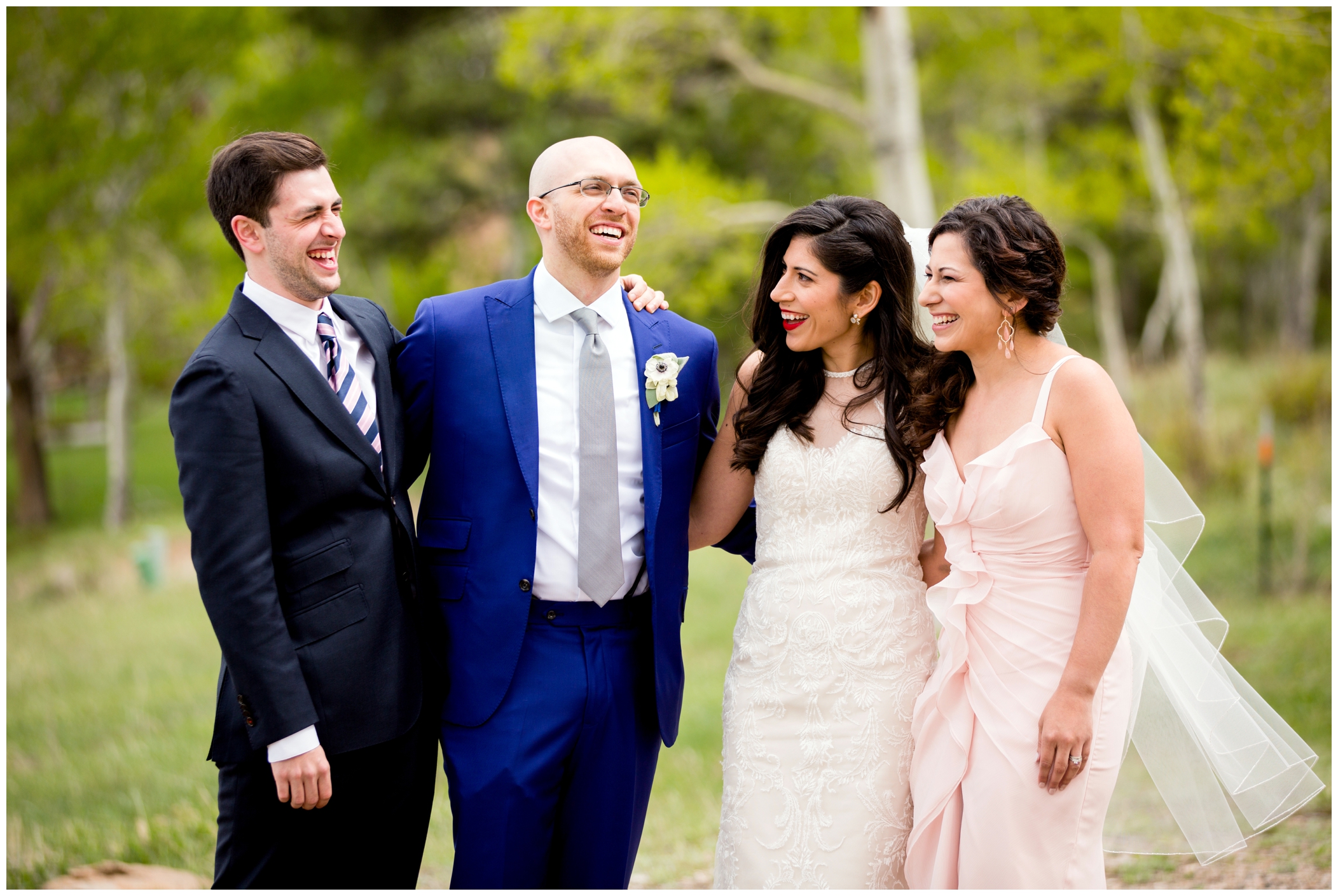 bridal party in pink and blue at Estes Park wedding