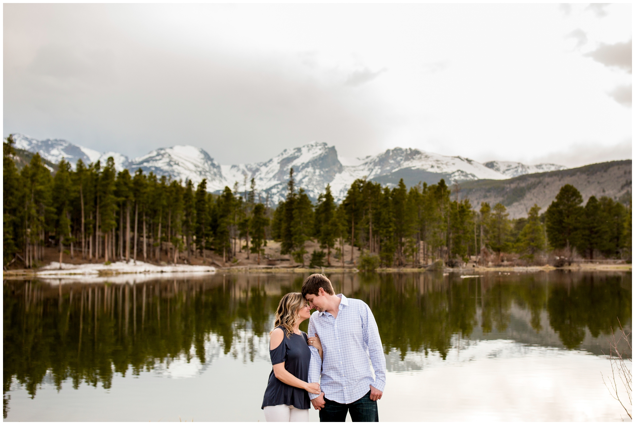 colorado mountain engagement photos with beautiful lake in the background