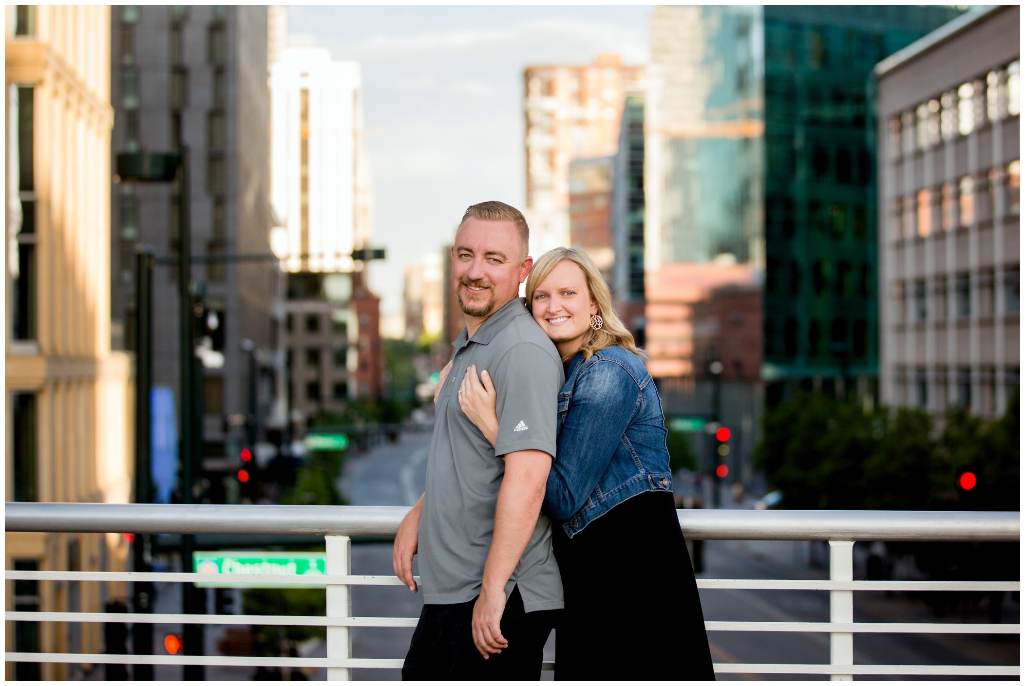 Downtown denver engagement photos with skyscrapers in background 
