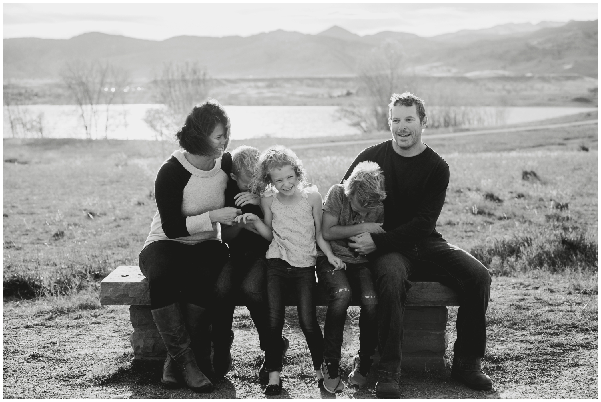 family tickle fight during Longmont Colorado family photographs