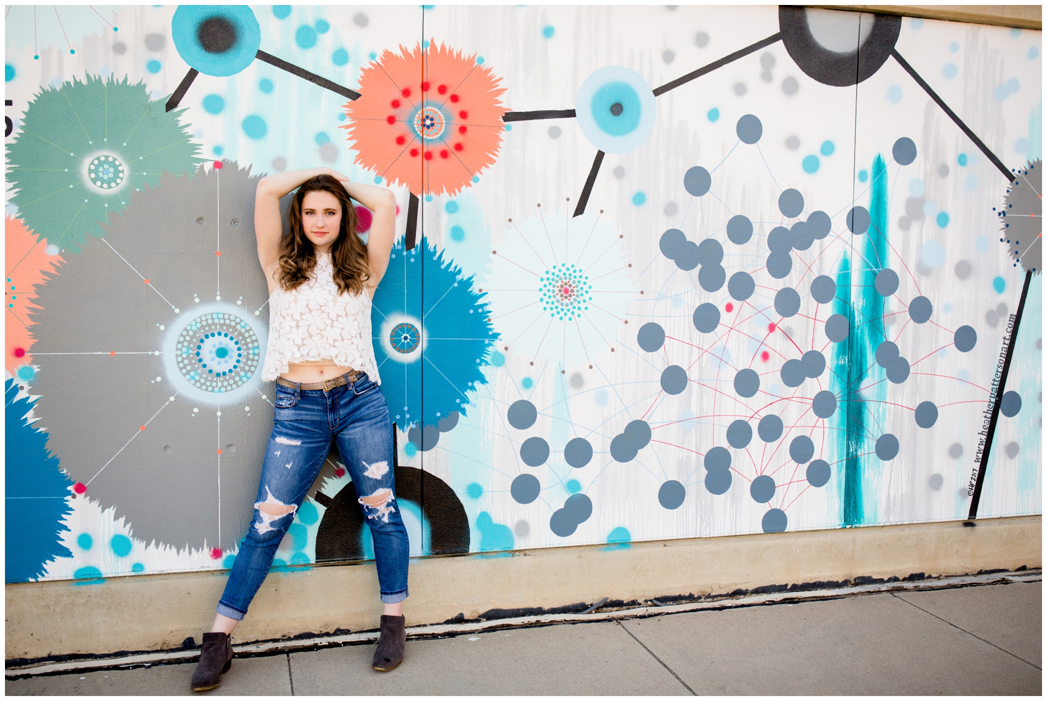 Longmont Colorado senior portraits against a urban graffiti wall 