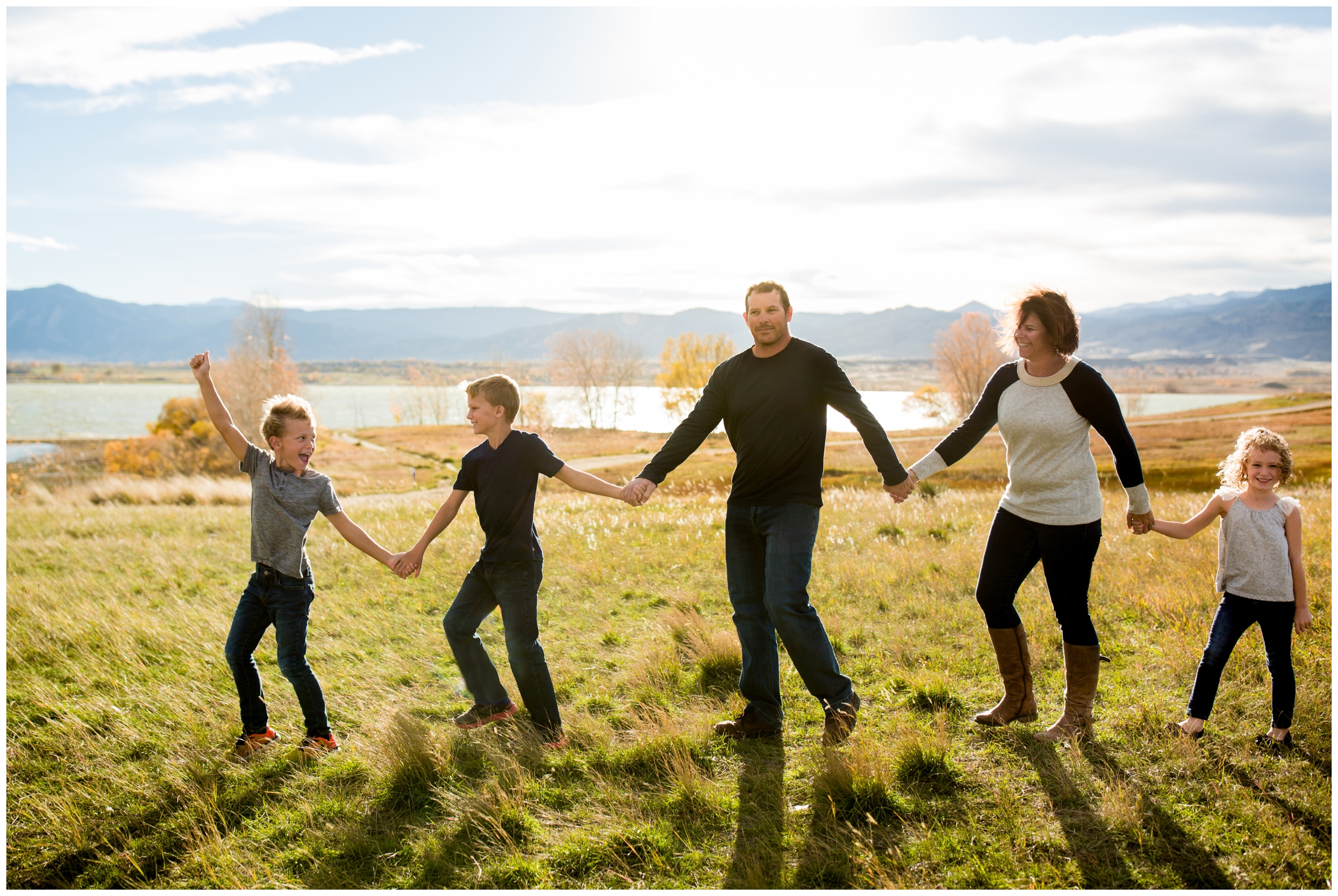 kids playing follow the leader at Longmont family portraits 