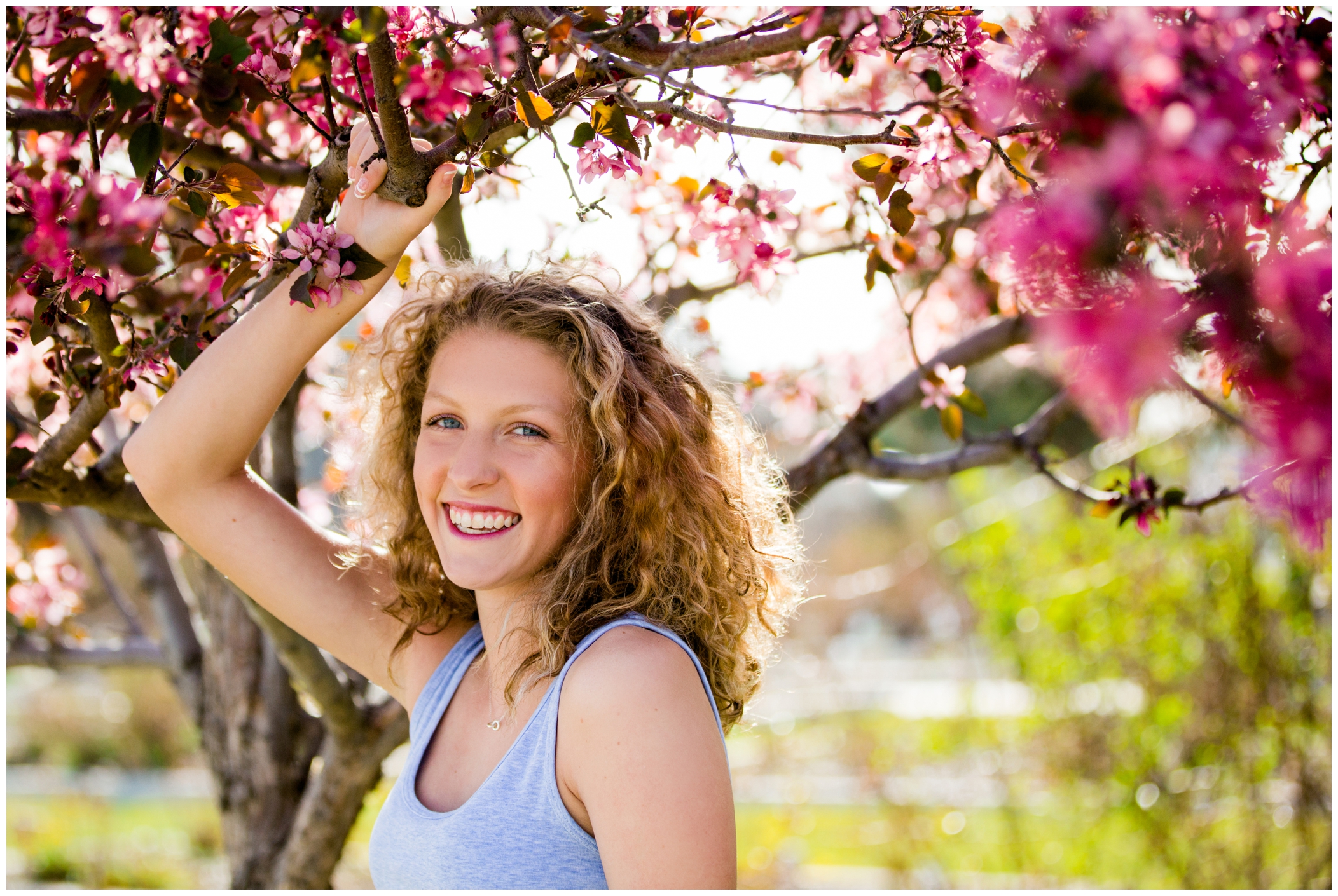 Mead High School senior photographs with spring blossoming trees 